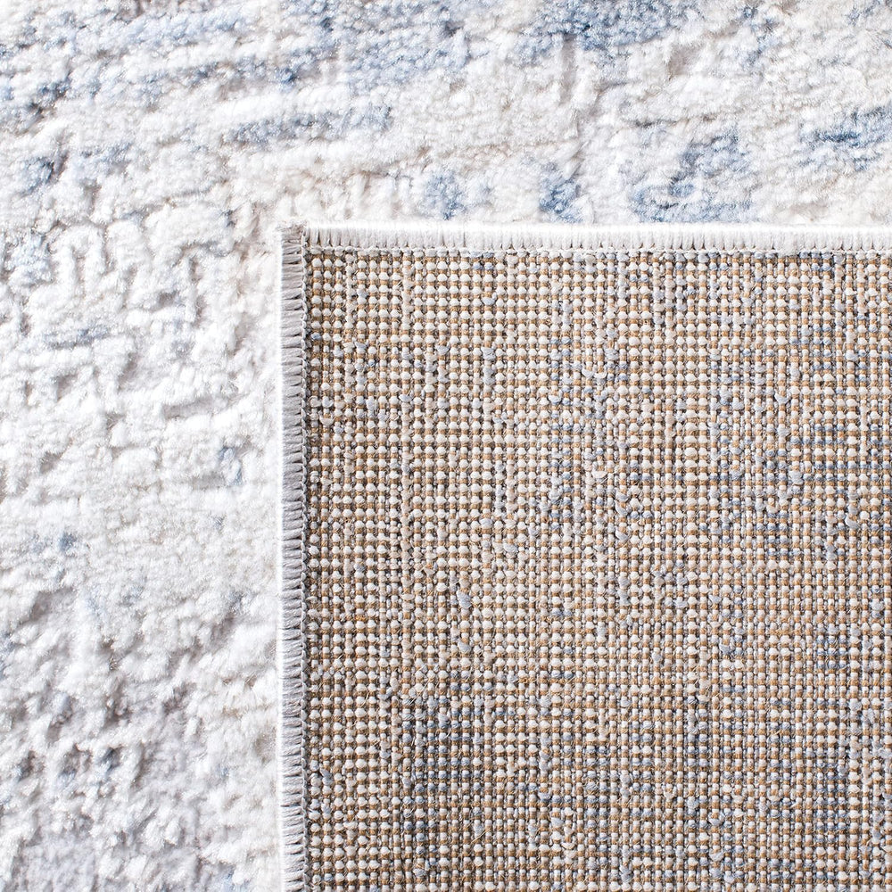 SAFAVIEH Amelia Collection Area Rug - 6' x 9', Ivory & Blue, Mode...