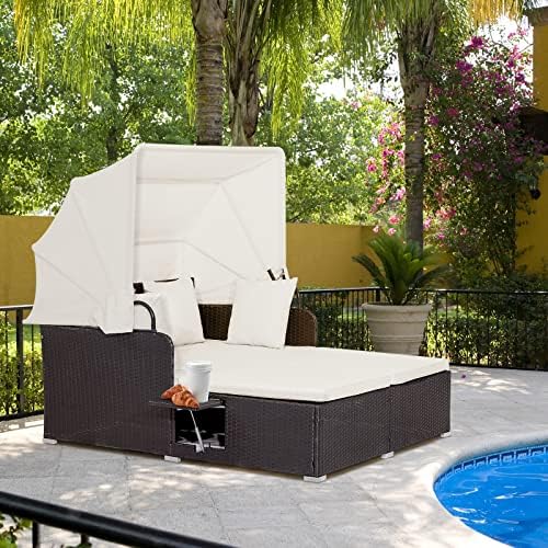 moccha outdoor daybed with retractable canopy, wicker cabana shown in use