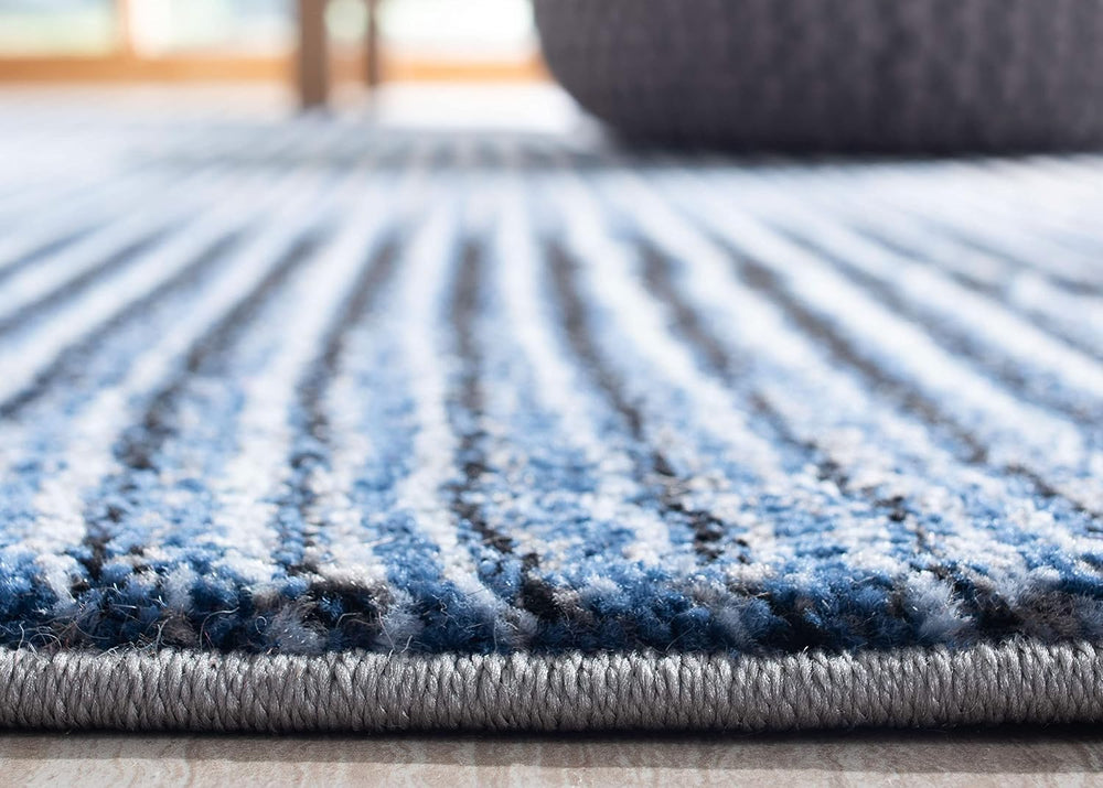 SAFAVIEH Galaxy Collection Area Rug - 9' x 12', Blue & Navy, Mode...