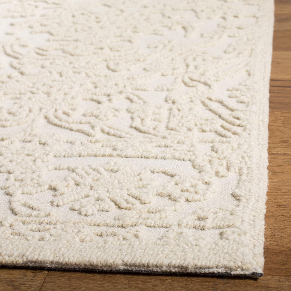 SAFAVIEH Trace Collection Area Rug - 10' x 14', Ivory, Handmade Wool,...