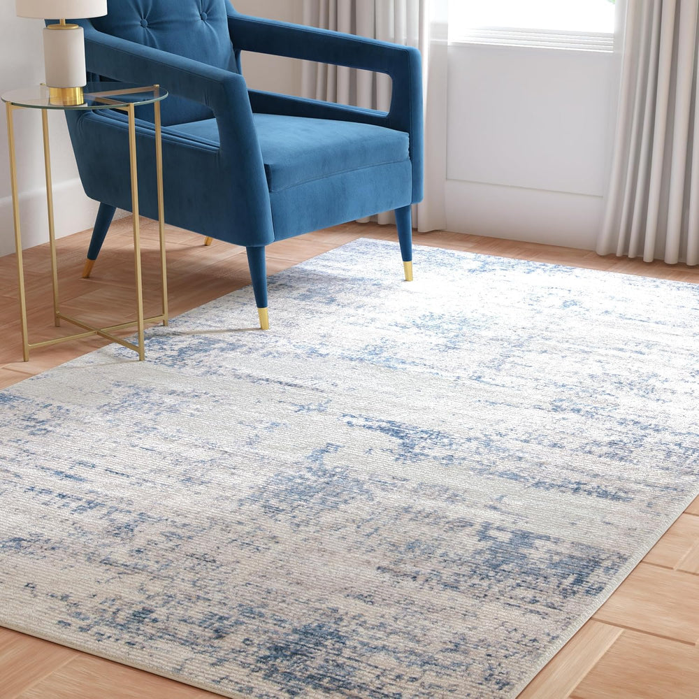 SAFAVIEH Amelia Collection Area Rug - 6' x 9', Ivory & Blue, Mode...