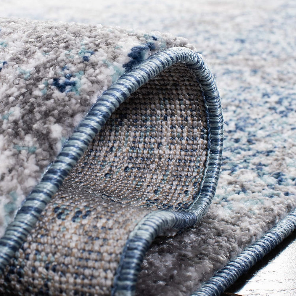 SAFAVIEH Aston Collection Area Rug - 10' x 14', Navy & Grey, Mode...