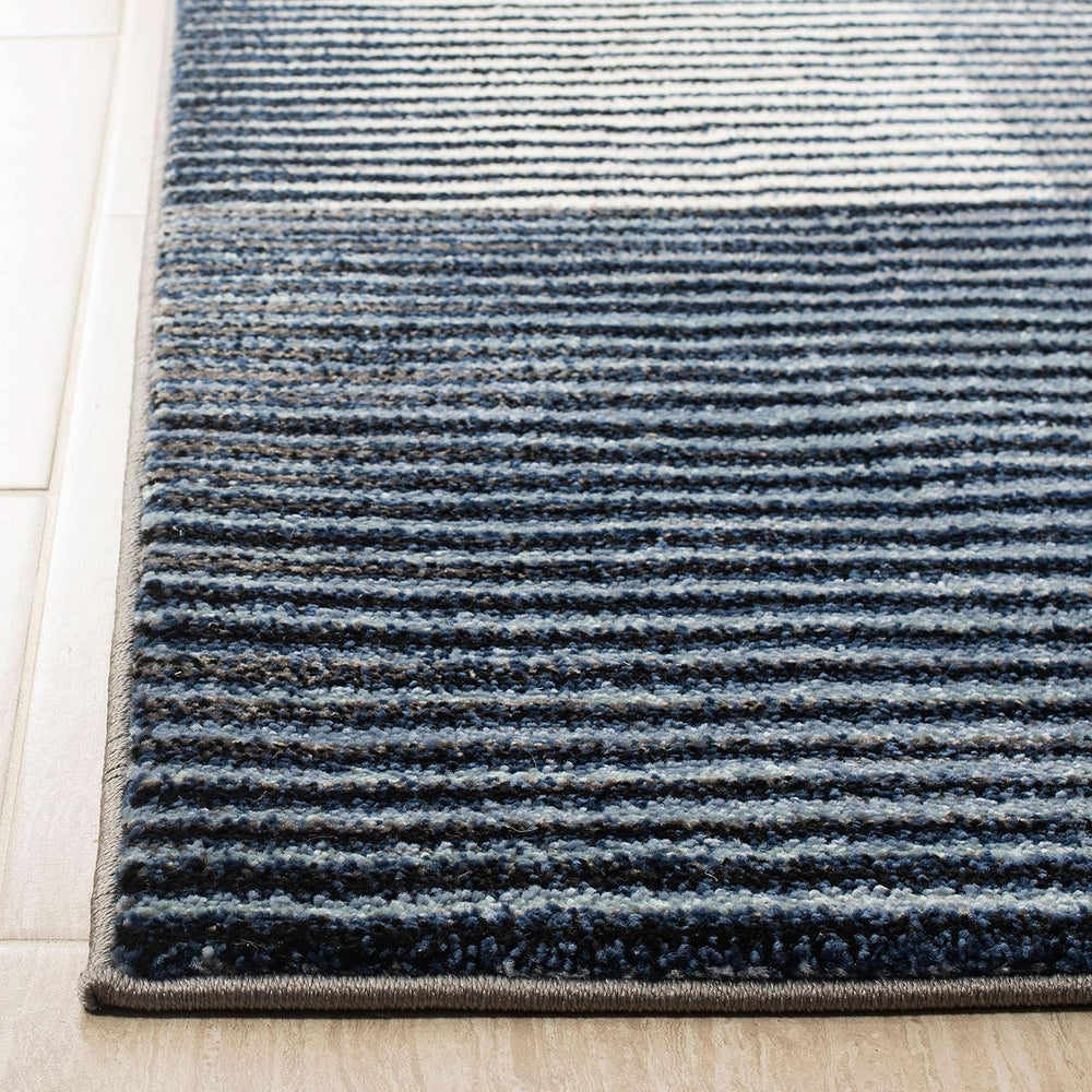 SAFAVIEH Galaxy Collection Area Rug - 9' x 12', Blue & Navy, Mode...