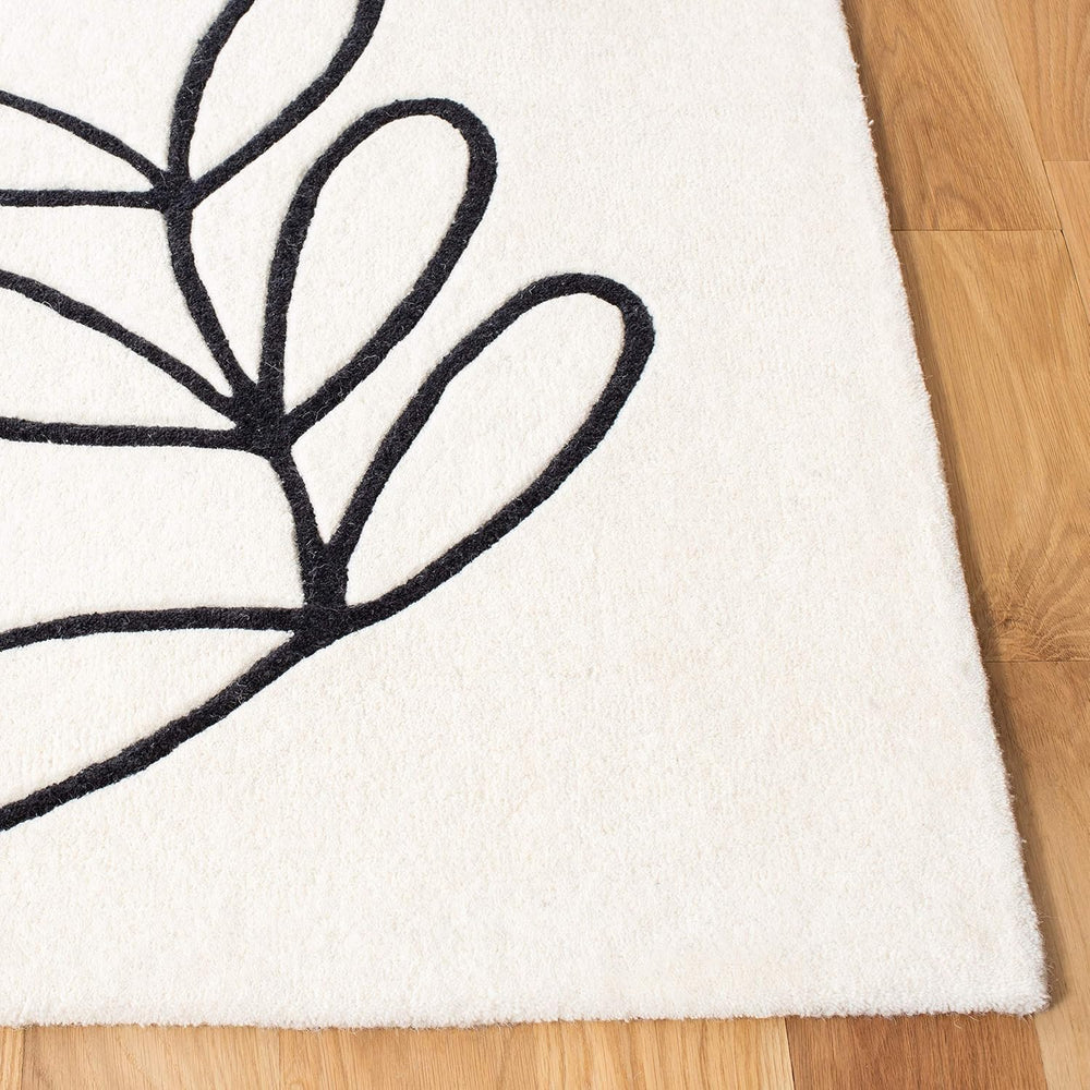 SAFAVIEH Fifth Avenue Collection Area Rug - 9' x 12', Ivory & Bla...