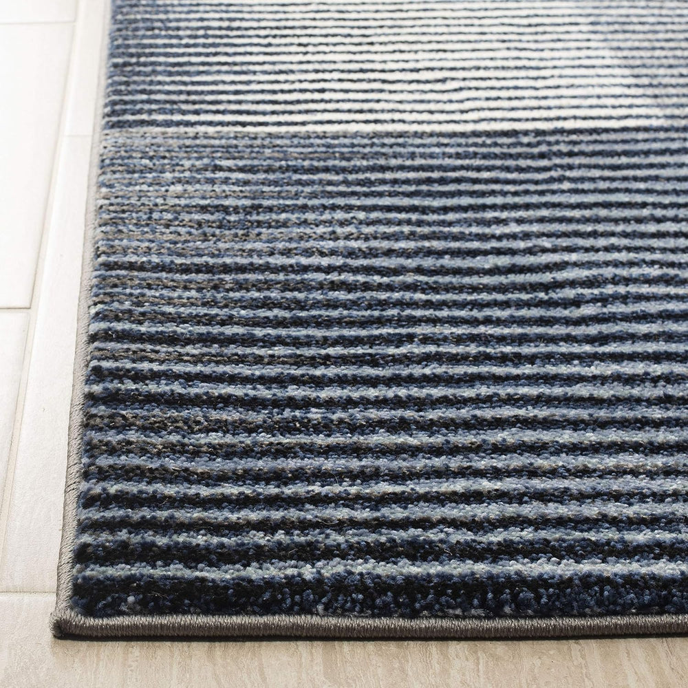 SAFAVIEH Galaxy Collection Area Rug - 9' x 12', Blue & Navy, Mode...
