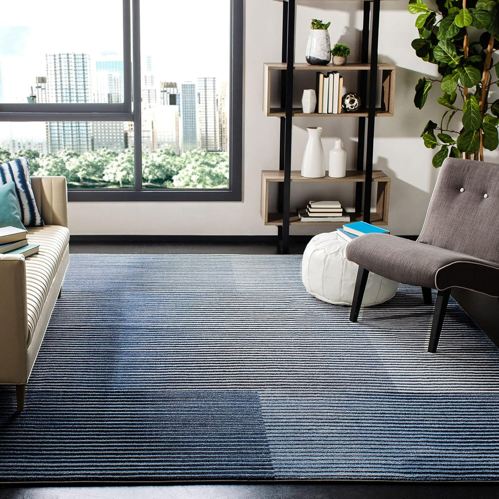 SAFAVIEH Galaxy Collection Area Rug - 9' x 12', Blue & Navy, Mode...