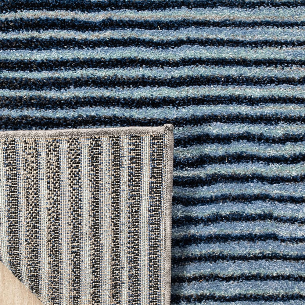SAFAVIEH Galaxy Collection Area Rug - 9' x 12', Blue & Navy, Mode...